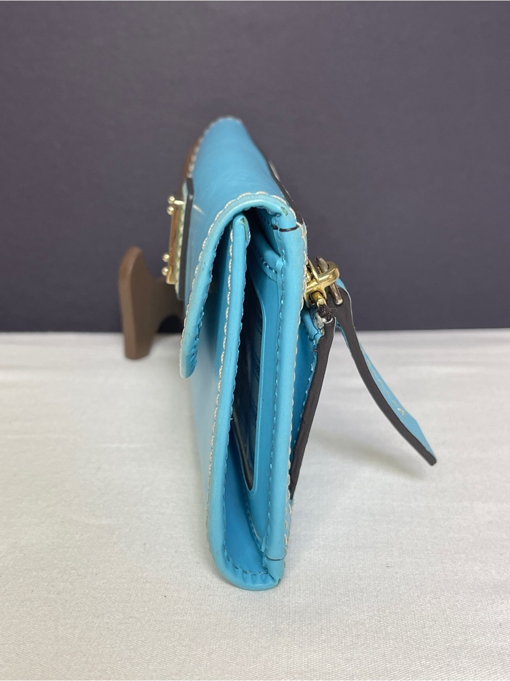 Dooney & Bourke Turquoise Leather Fold-Over Wallet with Gold Plaque - Picture 5 of 14